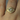 14k Yellow Gold Diamond-Shaped ring with a .25carat diamond in the center | On Model