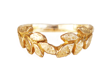 14k Yellow Gold ring shaped to be a wreath made up of textured leaves