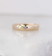 14k yellow gold Domed Diamond Band with 3 embeded  0.06ct of round brilliant cut Canadian diamonds
