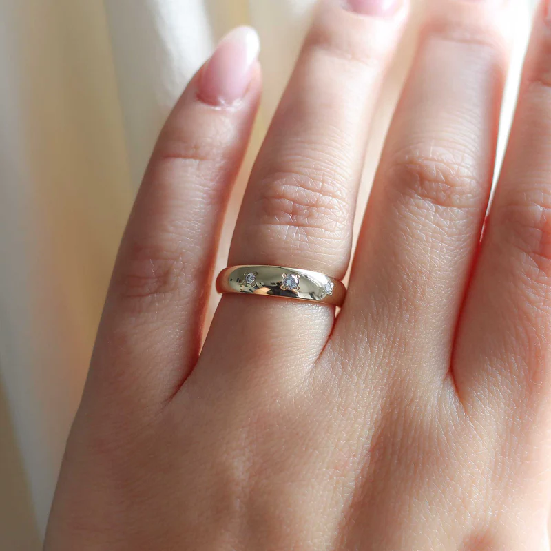 14k yellow gold Domed Diamond Band with 3 embeded  0.06ct of round brilliant cut Canadian diamonds | On hand model